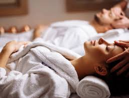 Crystals for mindfulness and presence arranged beside journal and cup of tea