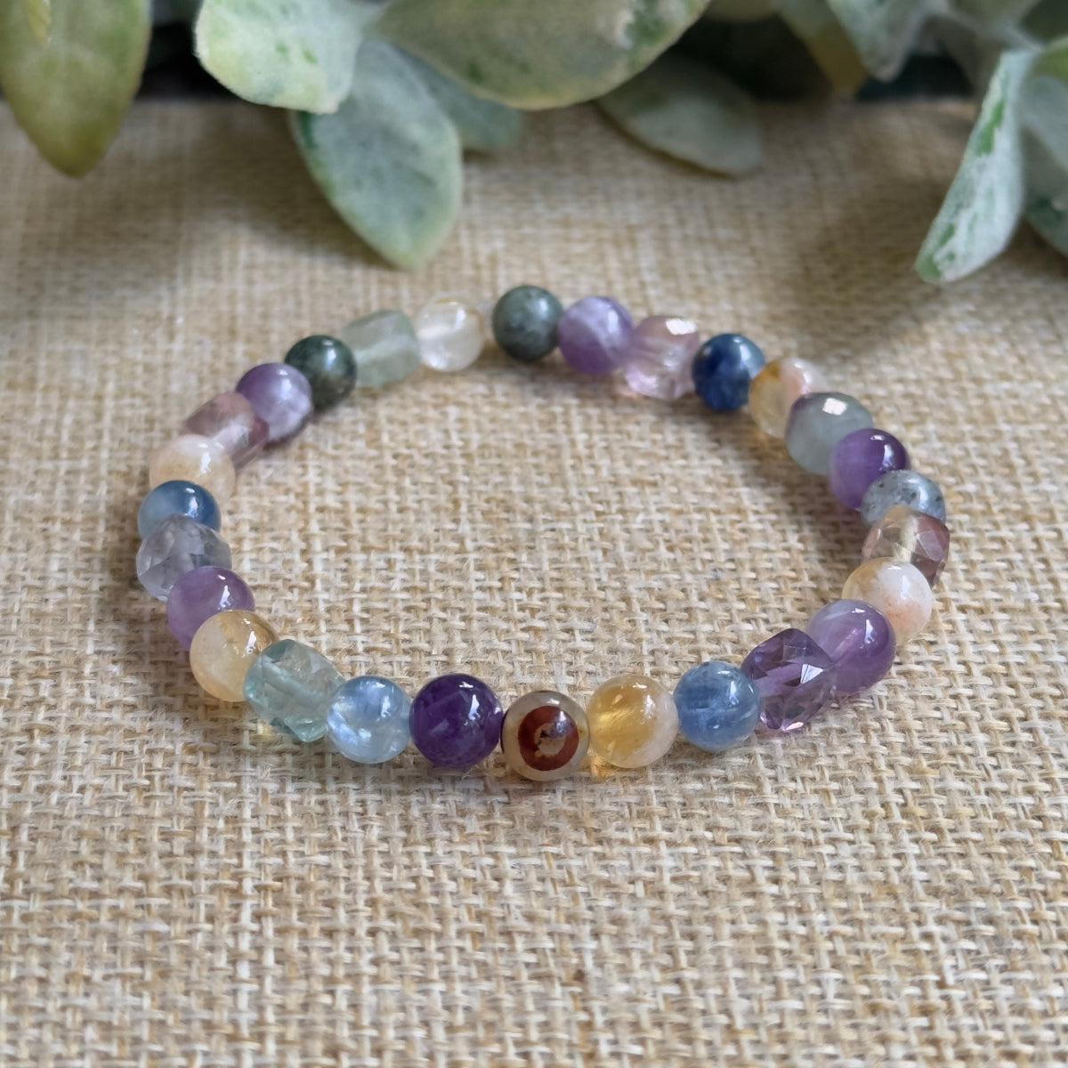 Four crystal alignment bracelet with fluorite citrine kyanite amethyst beads for chakra balancing meditation.