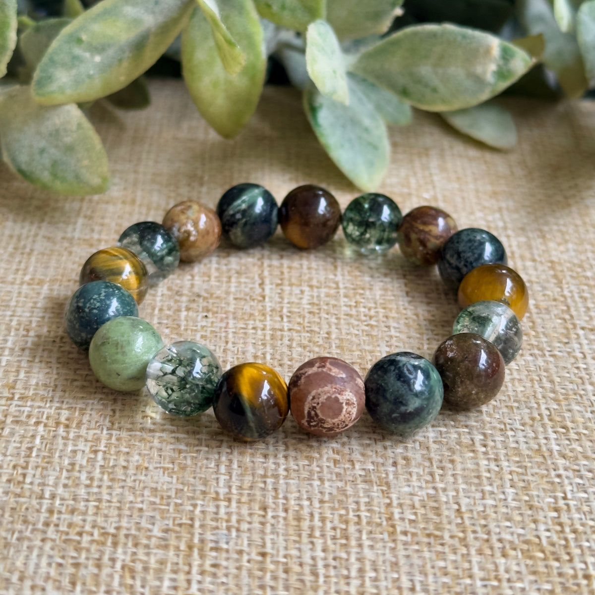 Gemstones

• Green Opal • Tiger Eye • Green Phantom Quartz • Kambaba Jasper

Properties

Personal Growth, Transformation, Renewal, Resilience, Perseverance, Courage, Confidence, Grounding, Stability, Emotional Balance, Inner Peace, Clarity, Focus, Intuition, Wisdom, Clears Stagnation, Breaking Through Obstacles, Overcoming Challenges, Abundance, Manifestation, Success