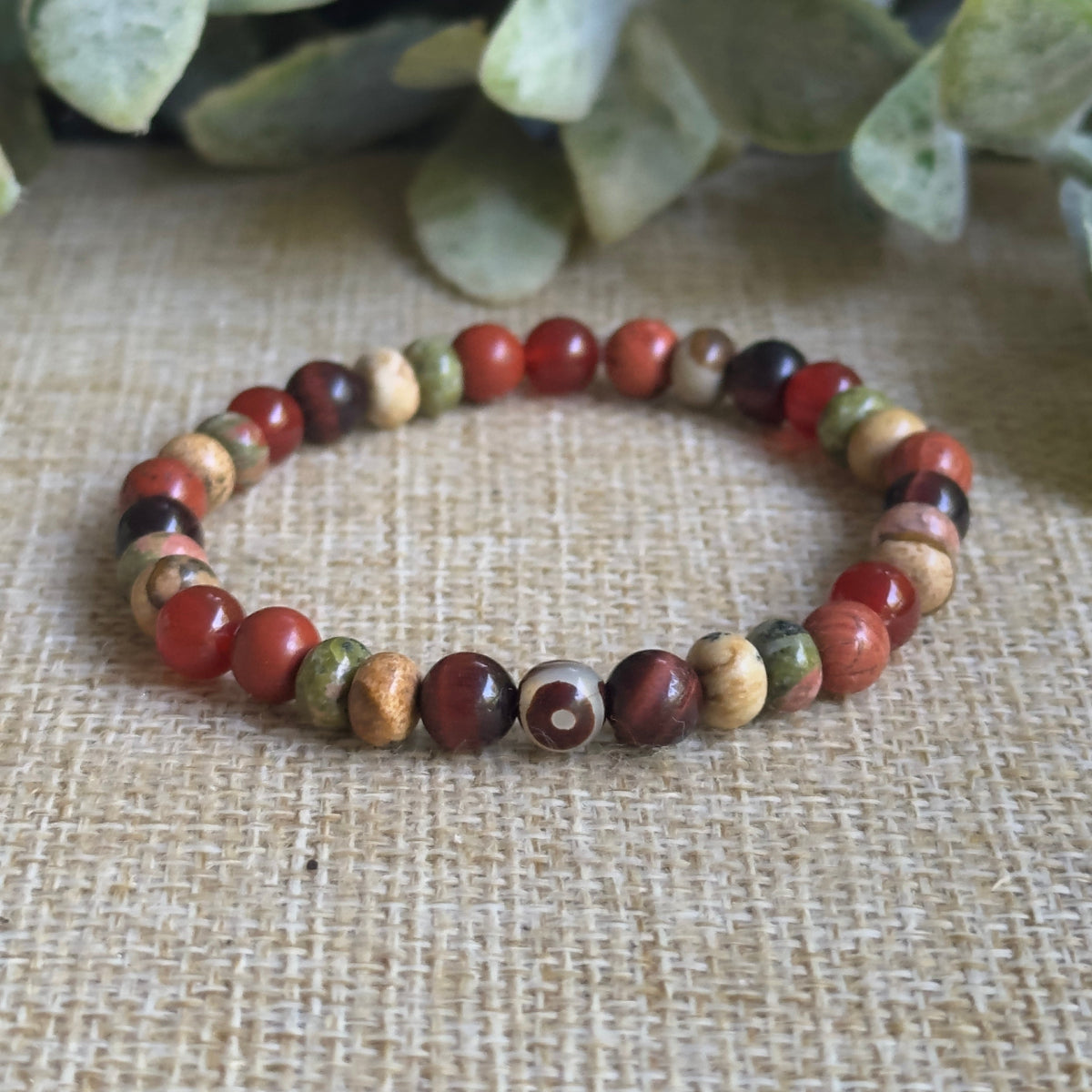 Natural crystal healing bracelet for Root Sacral and Heart Chakras