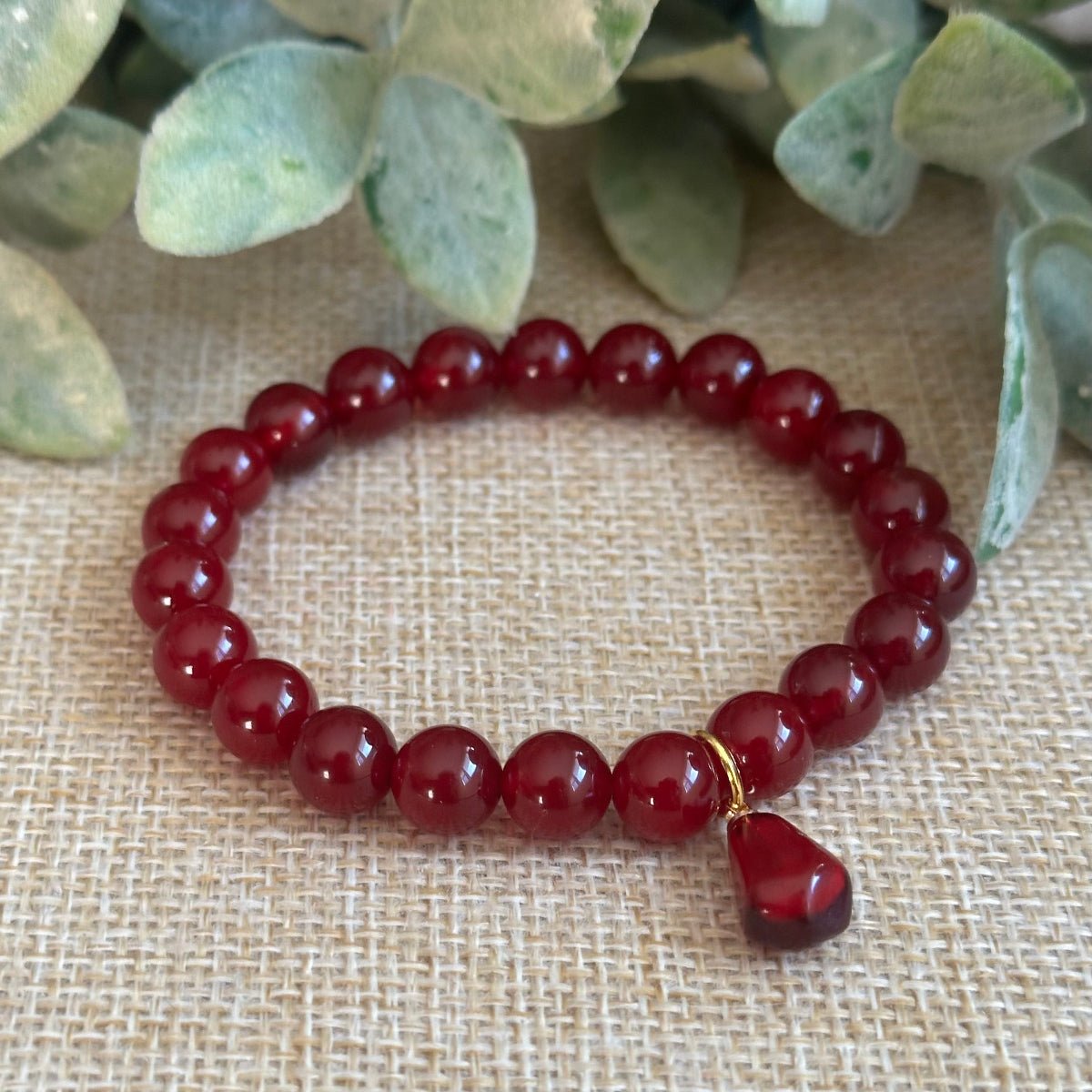 Unisex Red Jade Bracelet with optional pomegranate charm for men and women 