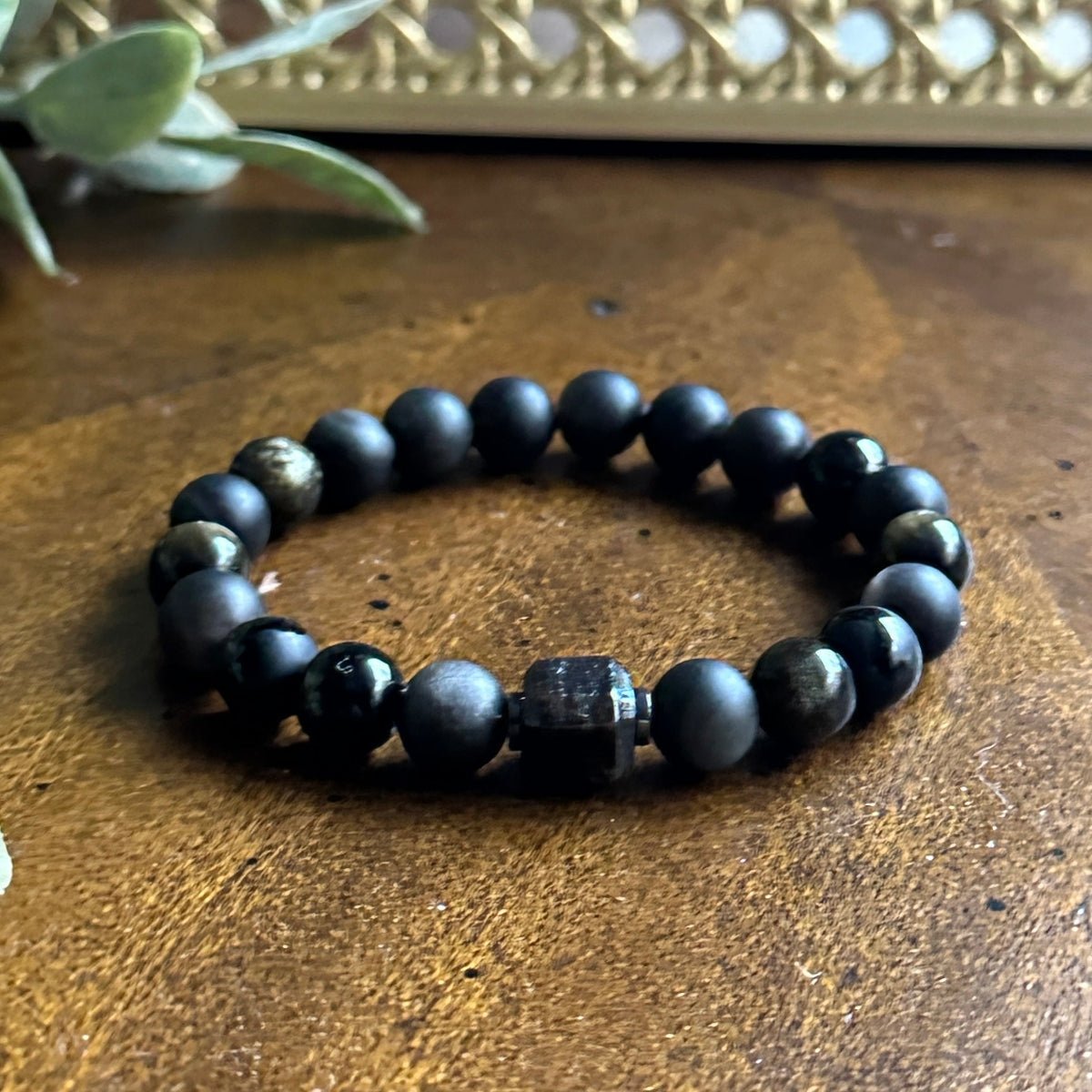 Depth bracelet with Arfvedsonite, Gold Sheen Obsidian, Silver Sheen Obsidian, Hematite, and Tibetan Agate