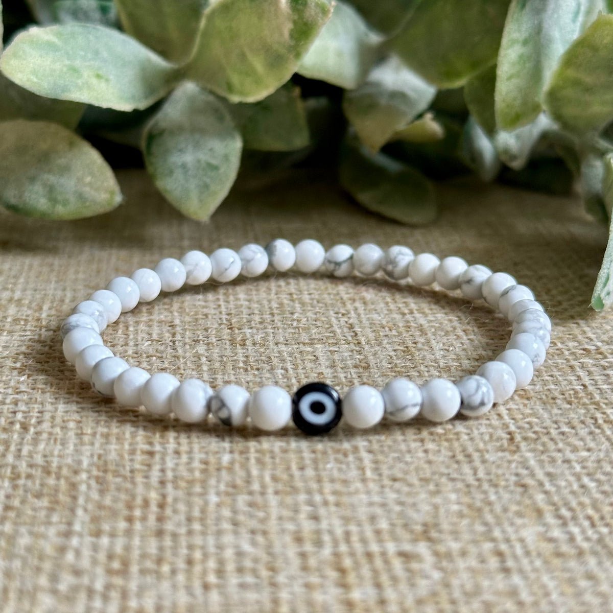 white howlite bracelet with blue evil eye beads calm protection jewelry