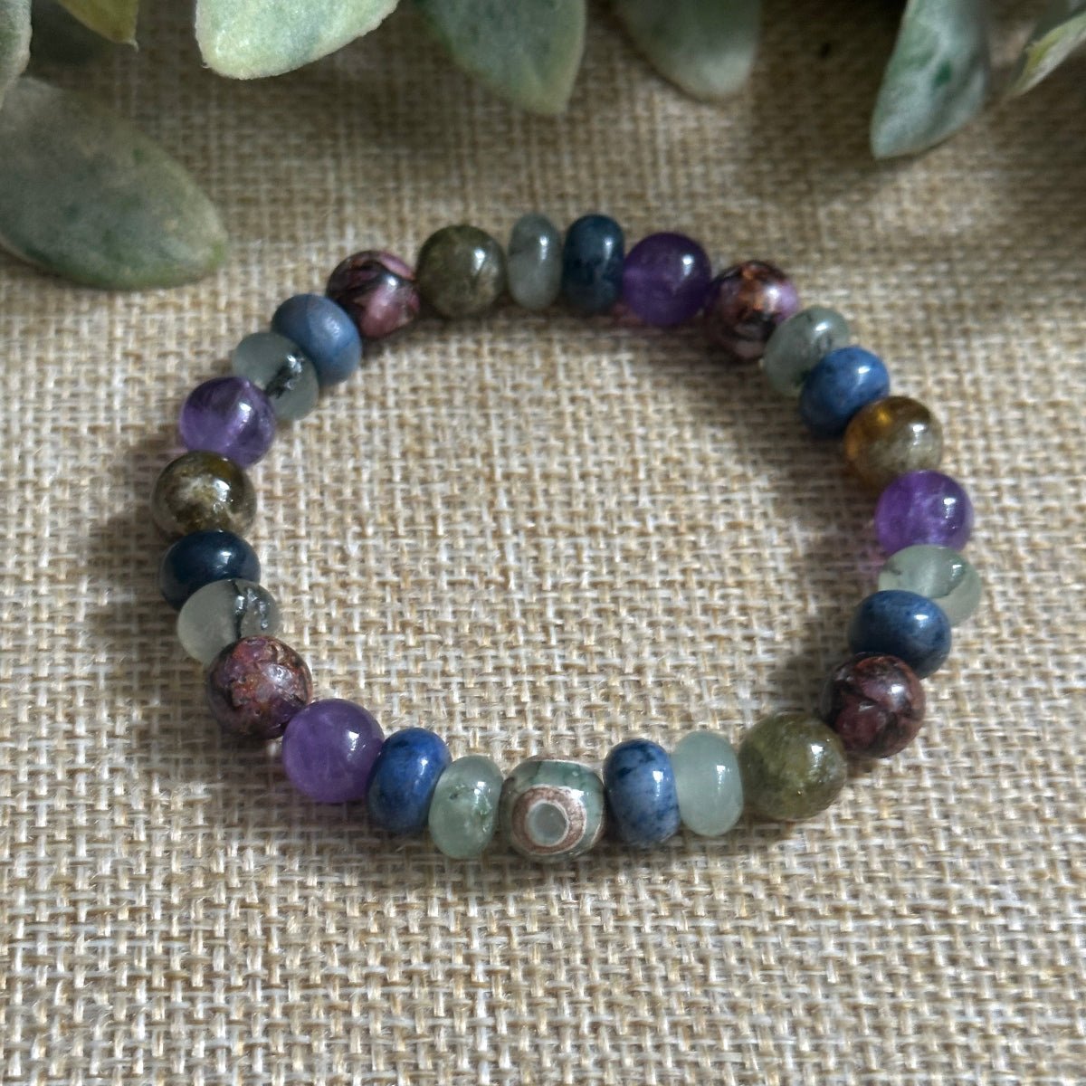 Crystal Bracelet to Support Emotional Boundaries and Energy Renewal

Empath Support Jewelry with Green Garnet and Lepidolite Stones