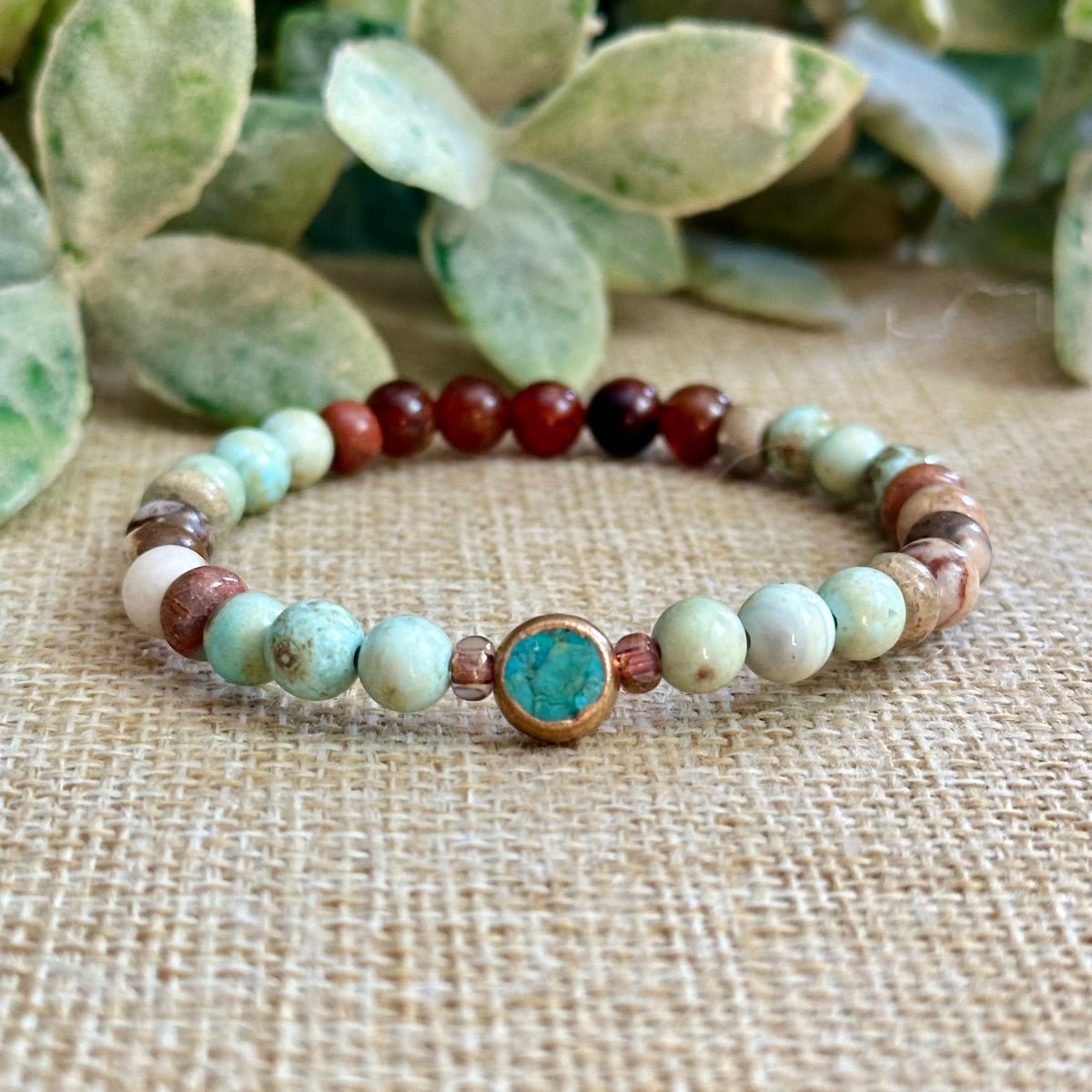 Everyday Magic gemstone bracelet with turquoise focal bead and earthy natural gemstones