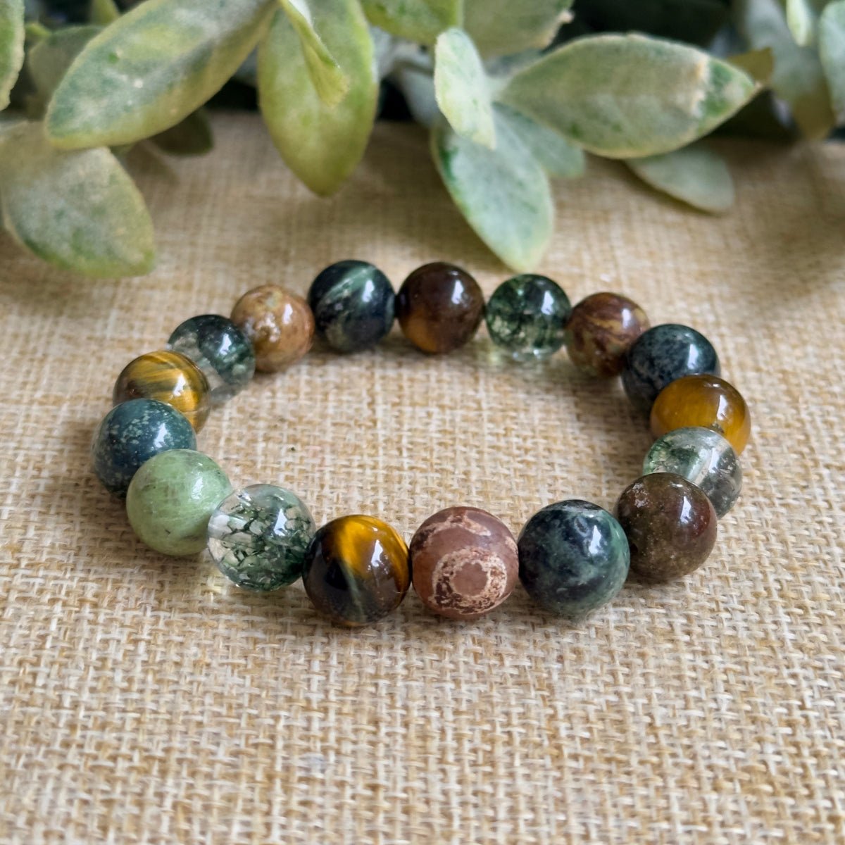 Gemstones

• Green Opal • Tiger Eye • Green Phantom Quartz • Kambaba Jasper

Properties

Personal Growth, Transformation, Renewal, Resilience, Perseverance, Courage, Confidence, Grounding, Stability, Emotional Balance, Inner Peace, Clarity, Focus, Intuition, Wisdom, Clears Stagnation, Breaking Through Obstacles, Overcoming Challenges, Abundance, Manifestation, Success