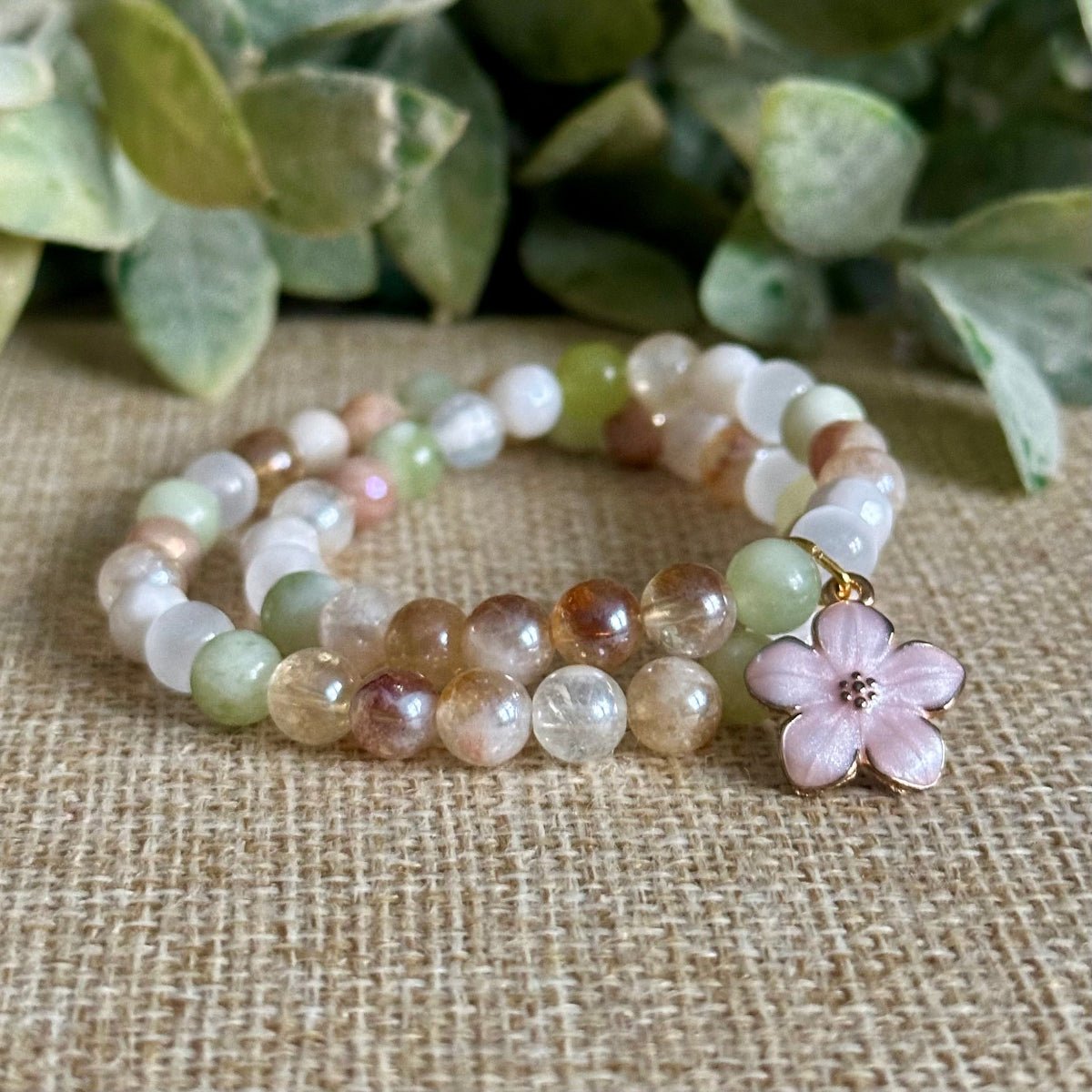Kids confidence crystal bracelet with pink hibiscus charm for calm self acceptance and emotional balance