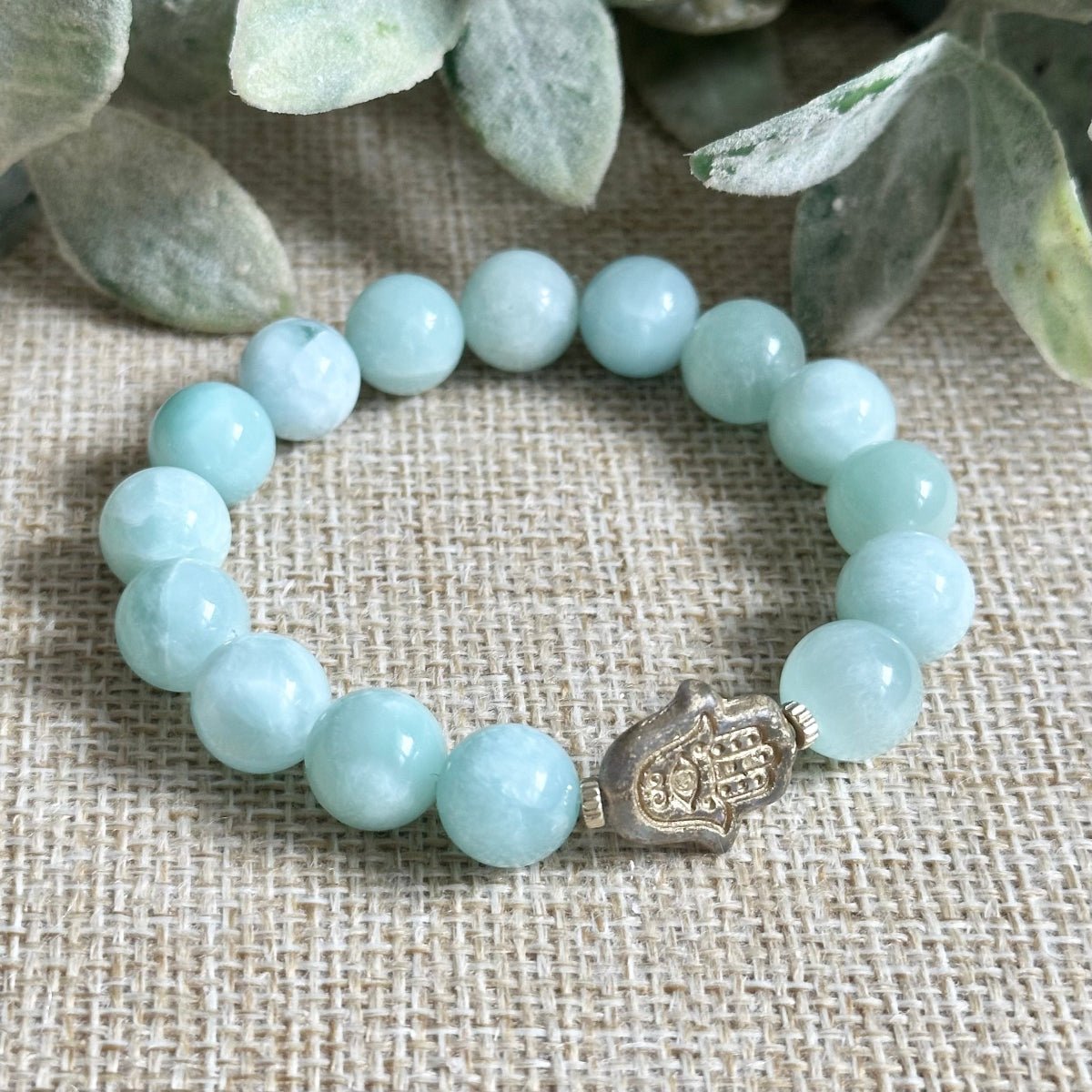 jadeite abundance bracelet green stone with hamsa
prosperity bracelet jadeite beads 10mm
jadeite luck bracelet with protective hamsa charm
green gemstone bracelet for wealth and good fortune