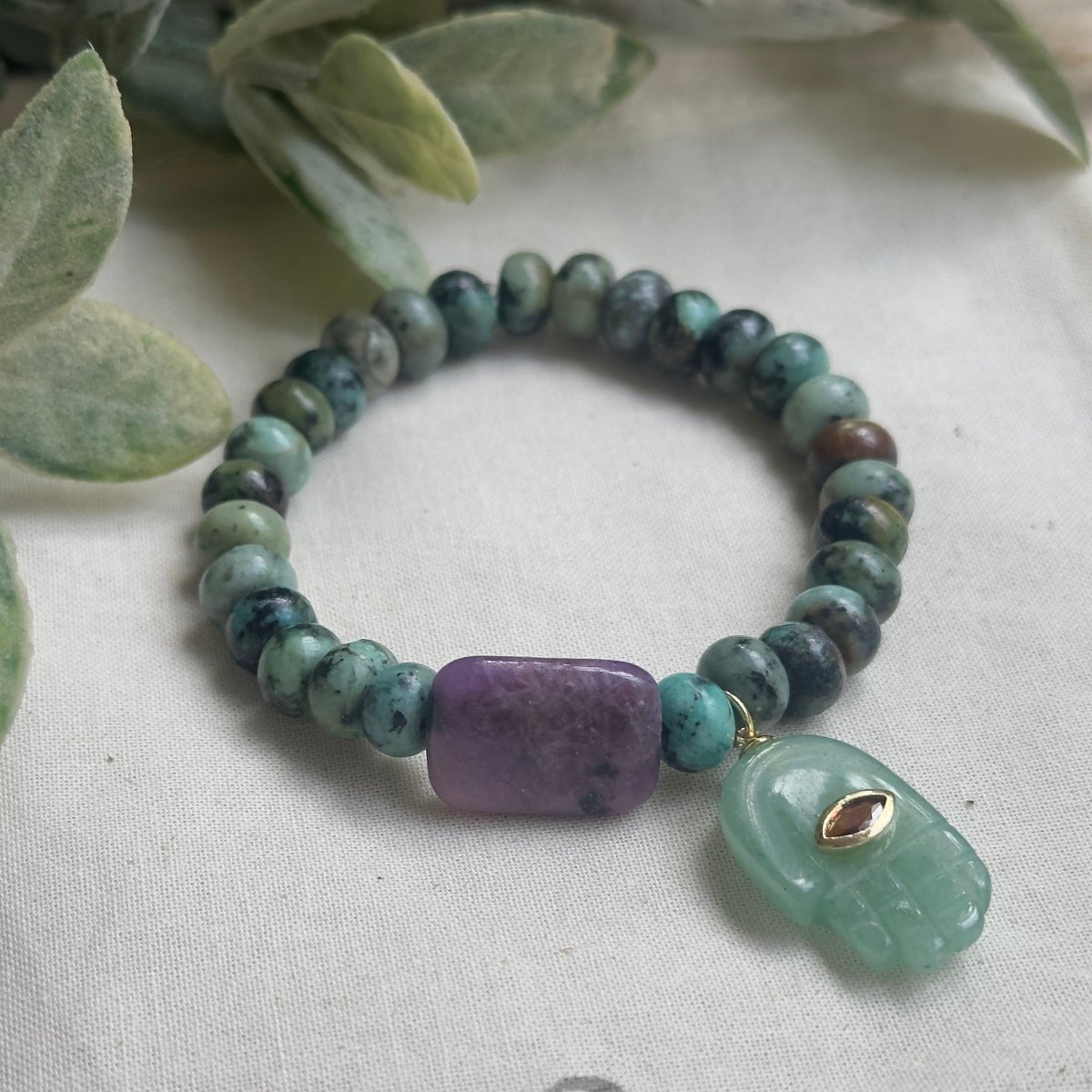 african turquoise lepidolite and green aventurine bracelet with cotton gift pouch.