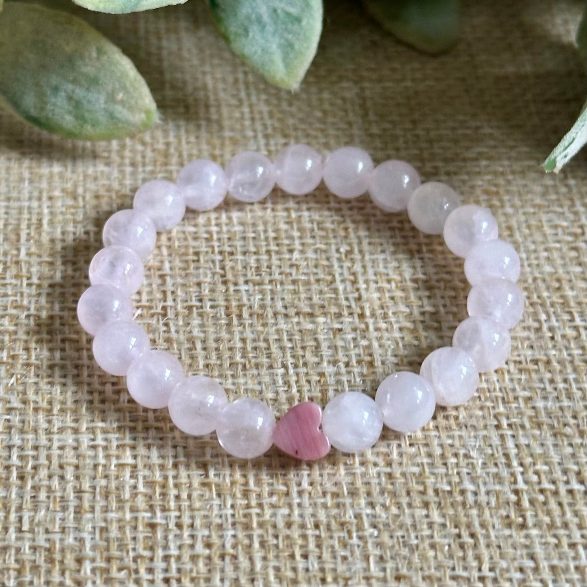 kids gemstone bracelet for kindness and self love
rhodonite heart bracelet for children