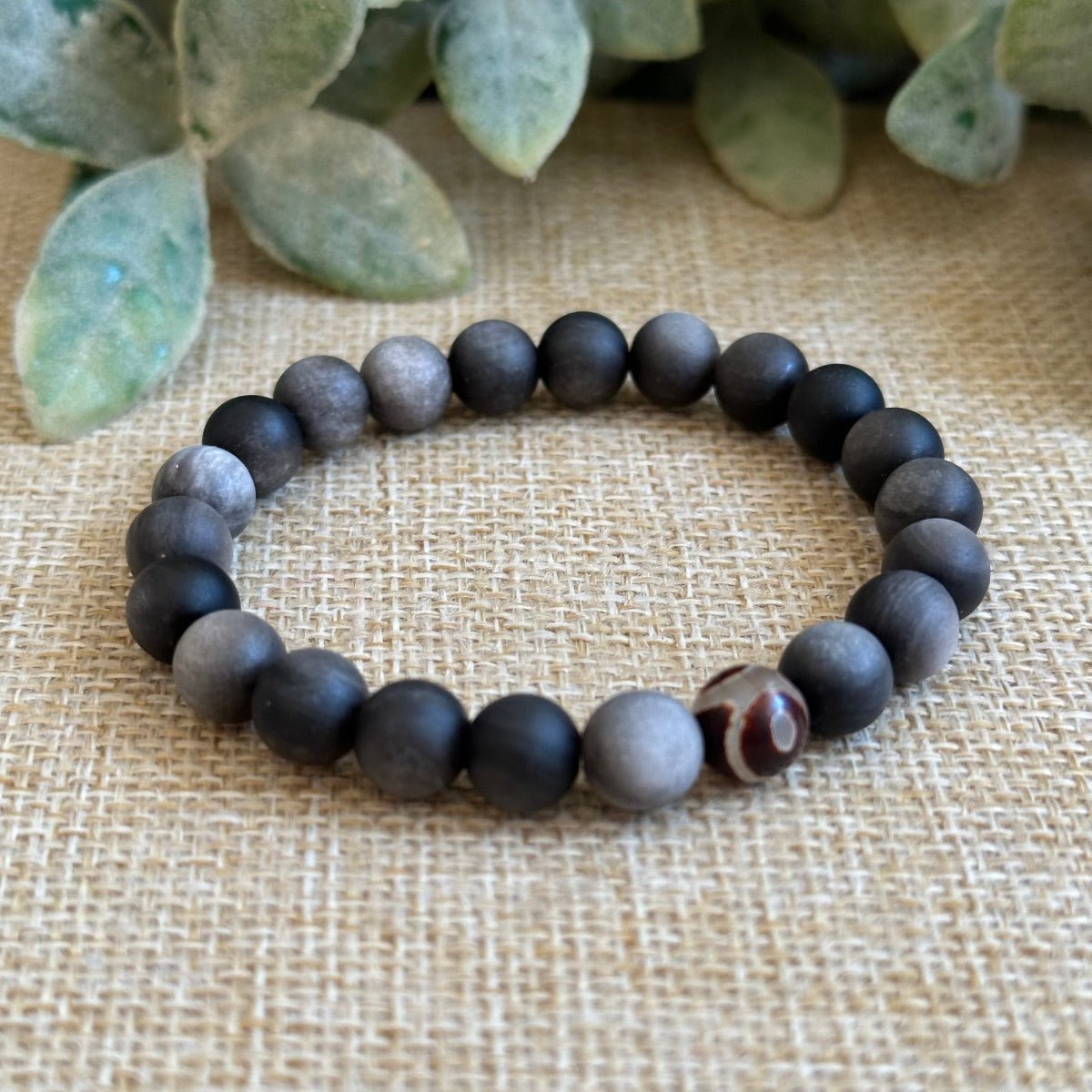 Obsidian bracelet for deflecting negative energy