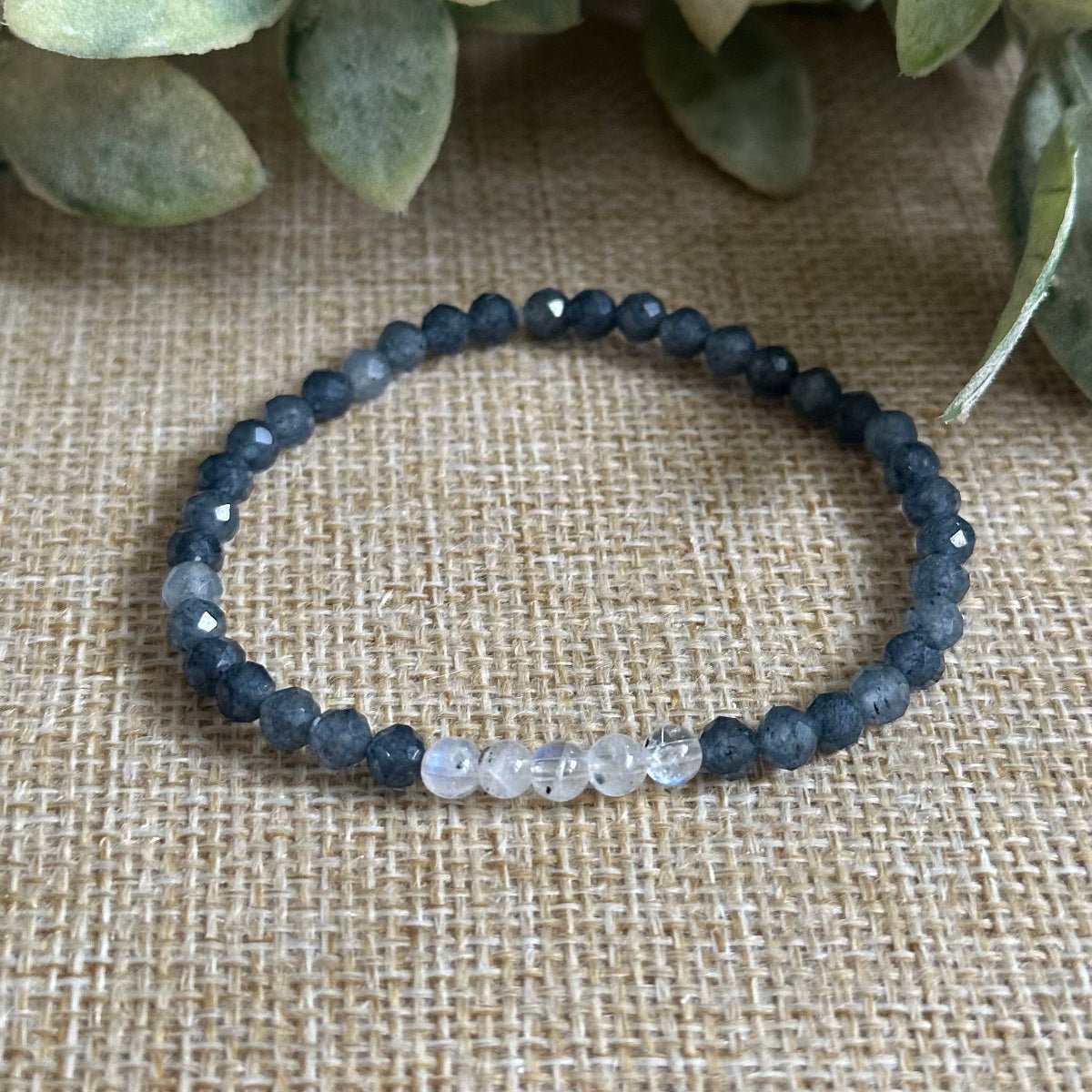 dainty clarity bracelet with moonstone and sapphire stones