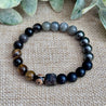 Matte Black Onyx and Silver Sheen Obsidian bracelet with DZI Agate charm