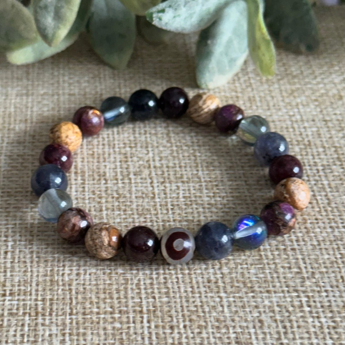 Unisex positive energy bracelet with jasper garnet and optional DZI agate
Crystal bracelet for calm confidence clarity and grounded optimism