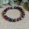 Jewel tone gemstone seven chakra bracelet with DZI Agate for protection