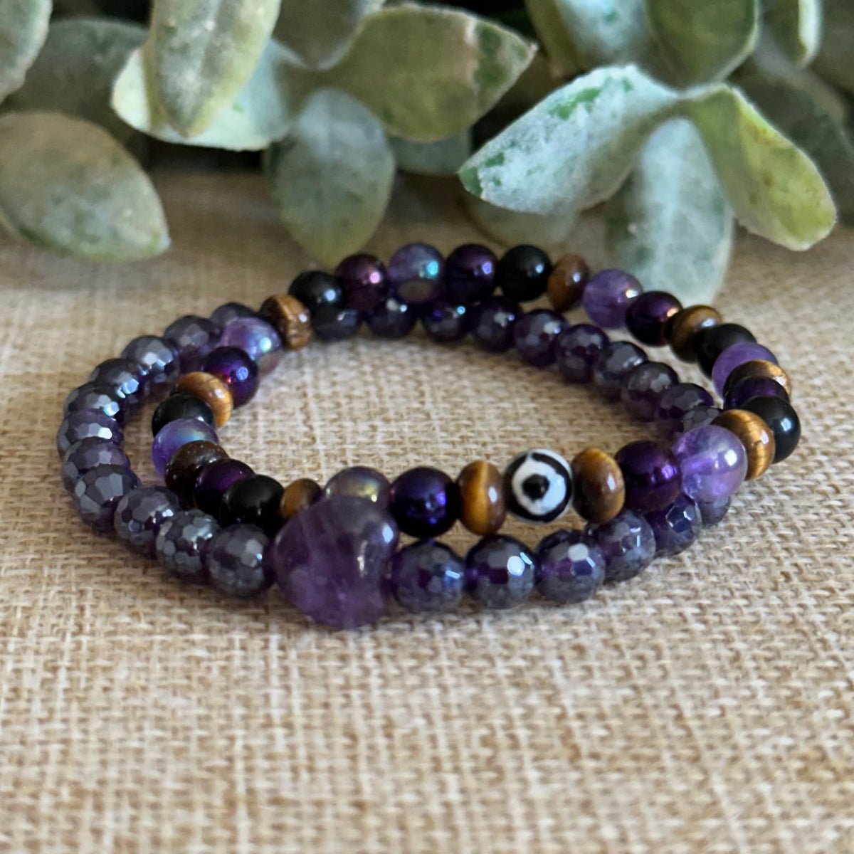Minimalist spiritual protection bracelet with calming purple tones. Stacking Bracelets. Evil Eye Bracelet