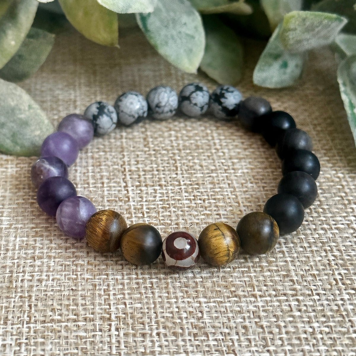 Grounding and Protective Bracelet featuring Snowflake Obsidian and Amethyst