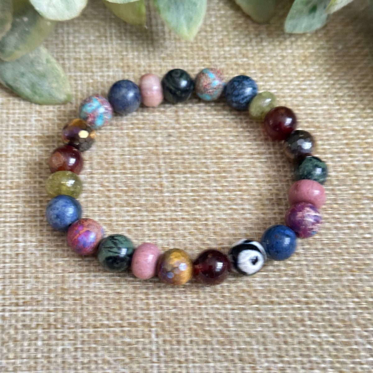 Roots and Wings bracelet representing the art of harmony, balance, and personal evolution