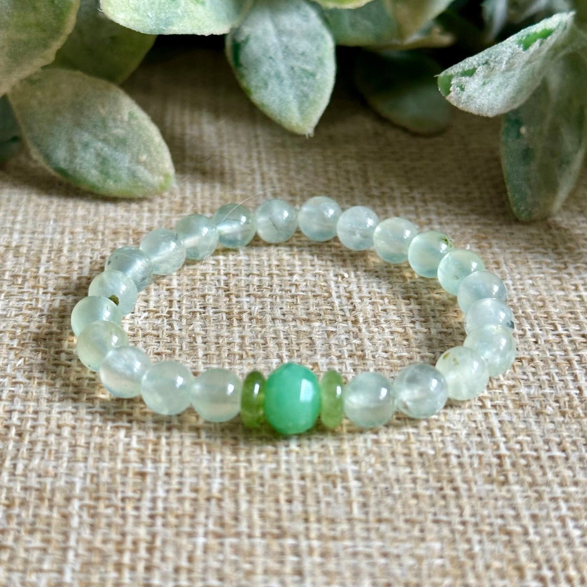 children gemstone bracelet growth calm
kids bracelet green stones close up