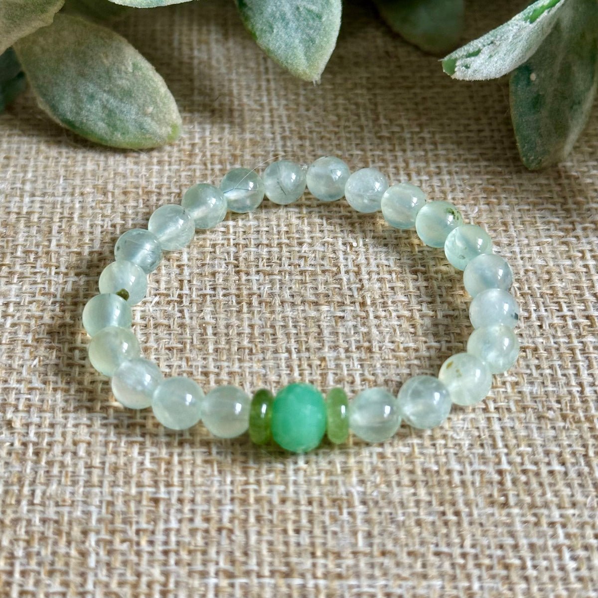 sprout kids crystal bracelet on neutral background
small 6mm green gemstone bracelet kids