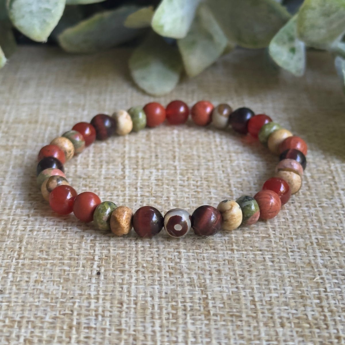 Natural crystal healing bracelet for Root Sacral and Heart Chakras