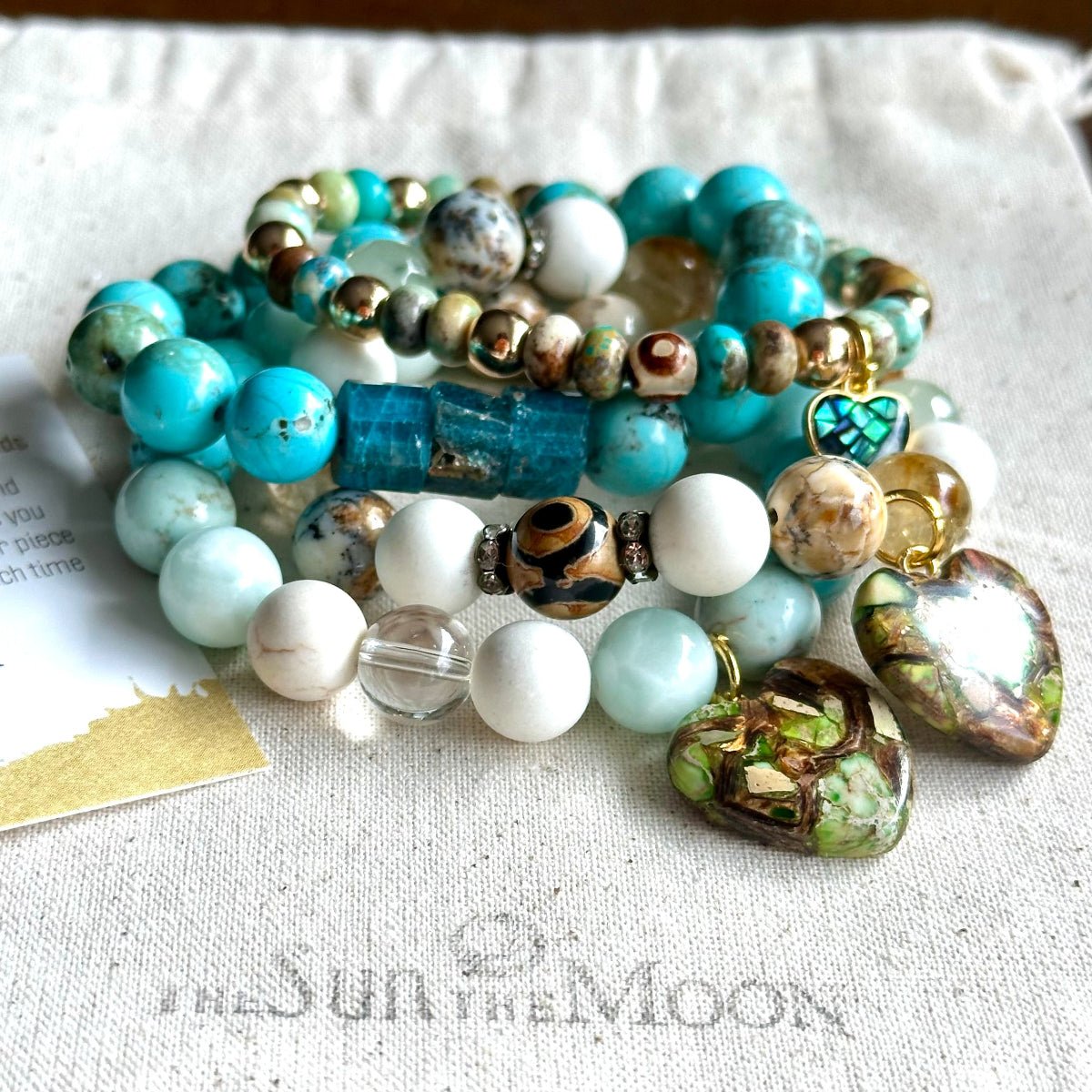 Beach life stacking bracelets with charms and bling