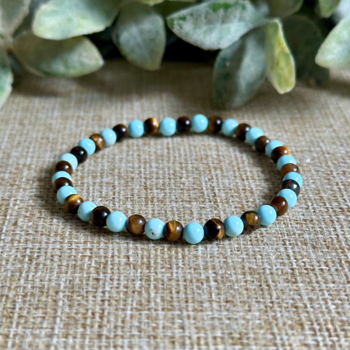 blue turquoise brown tiger eye gemstone bracelet
dainty turquoise and tiger eye beaded bracelet