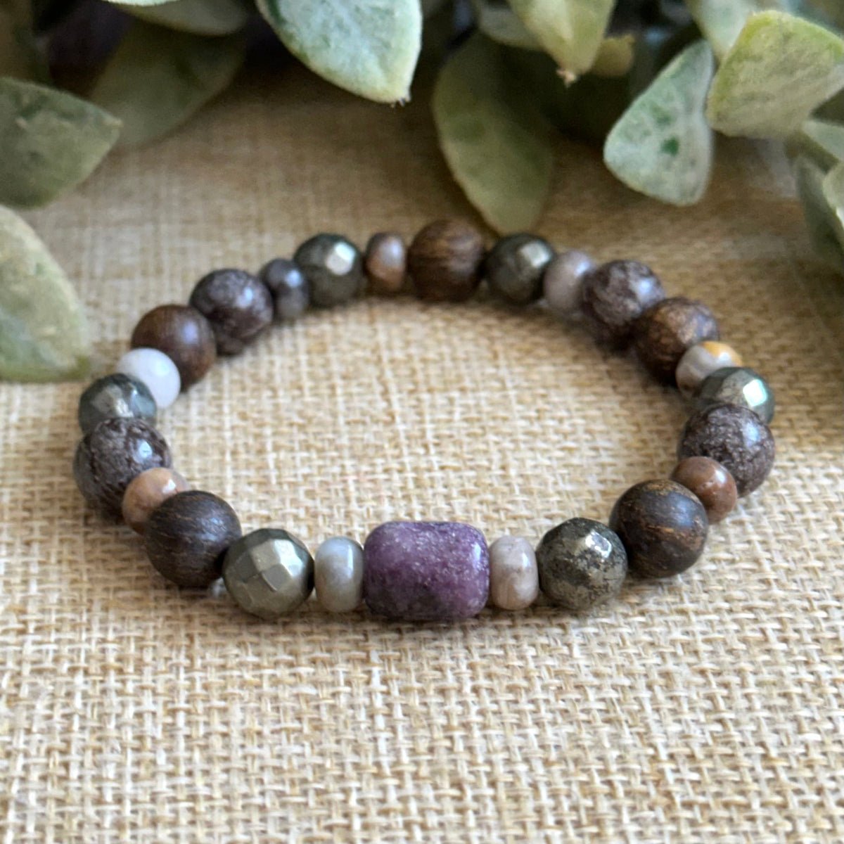 Lepidolite calm bracelet with grounding stones and neutral earth tones
