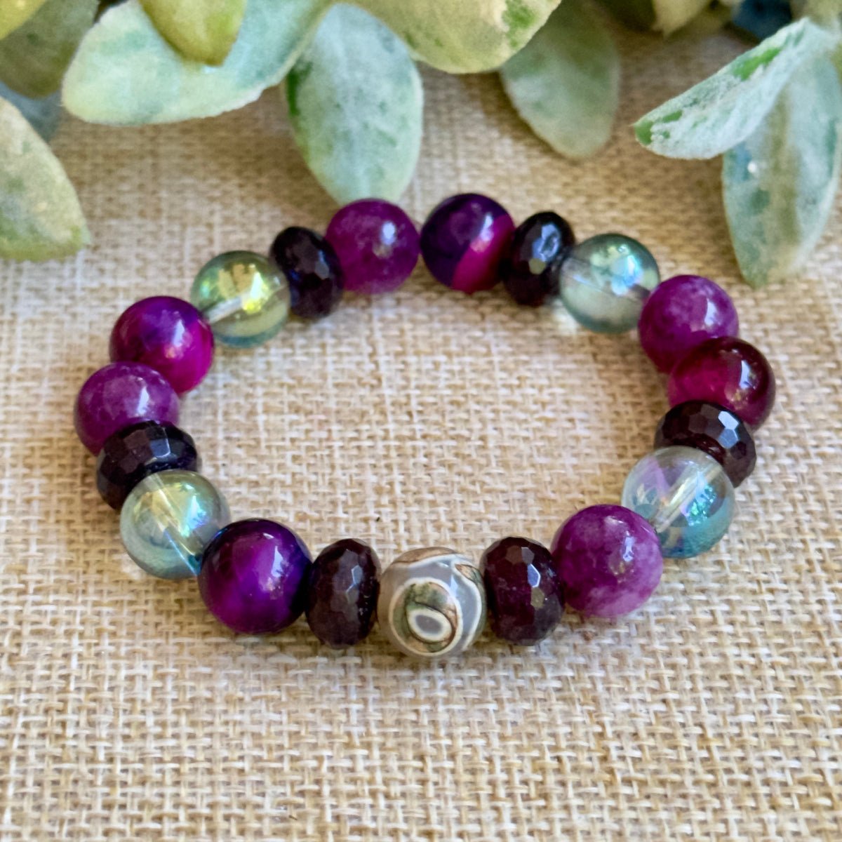 Women’s gemstone bracelet with Pink Tiger Eye, Garnet and Ocean Aura Quartz