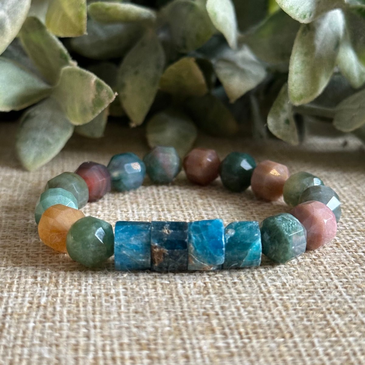 Calm clarity bracelet with blue opal hamsa charm