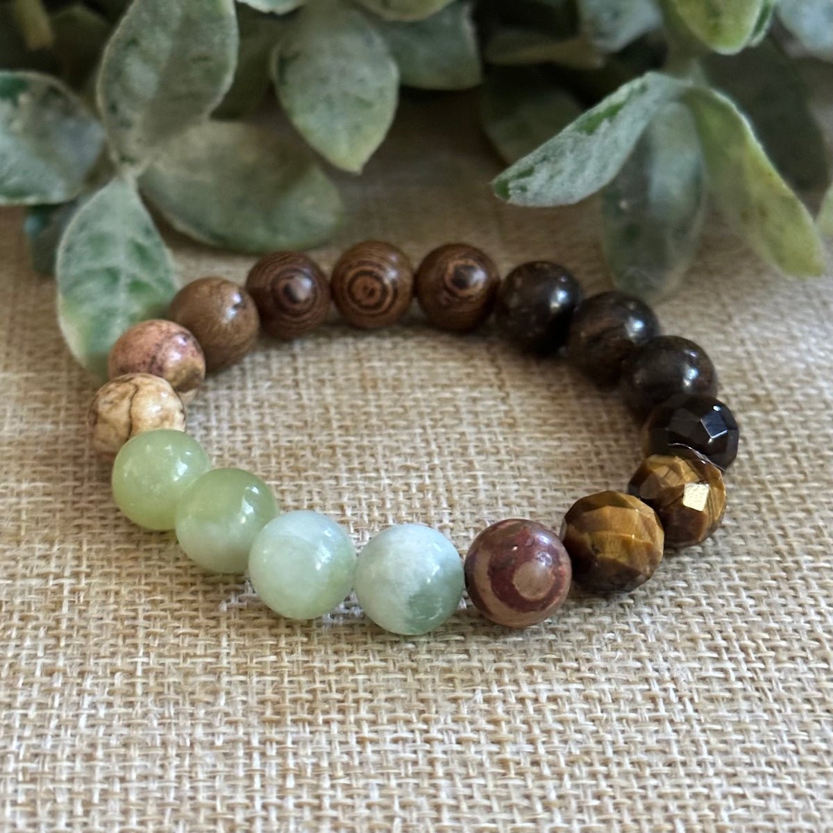 Earth toned gemstone bracelet for grounding confidence and protection
Natural 10mm gemstone bracelet with wood and earthy healing stones