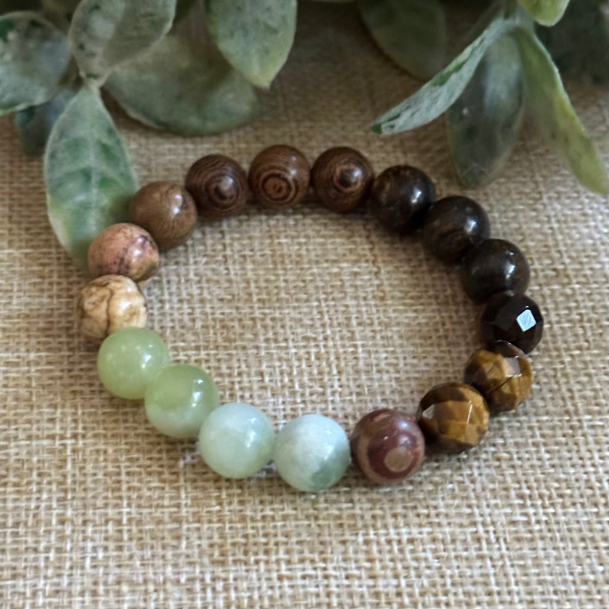 Tiger Eye and Bronzite gemstone bracelet with earthy woodland vibe
Grounding crystal bracelet with Picture Jasper Serpentine Jade and wood